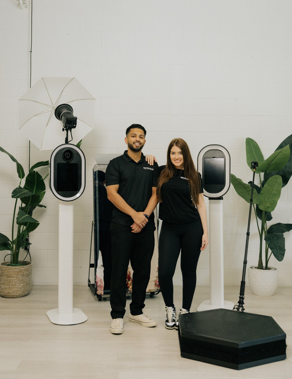 Cyril and Rameen, founders of Shutter Island Photo Booth, with the Glam, Mirror and 360 booths in the studio
