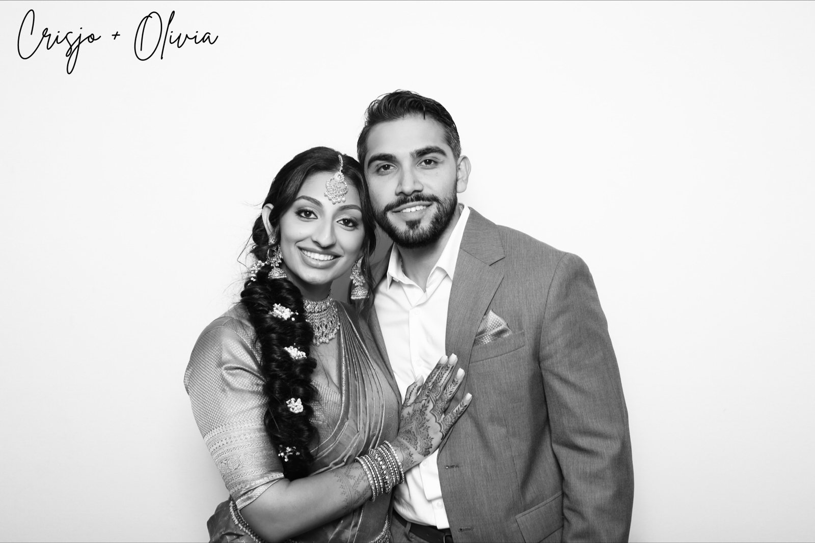 Black-and-white Glam Booth photo of a couple at a Houston wedding