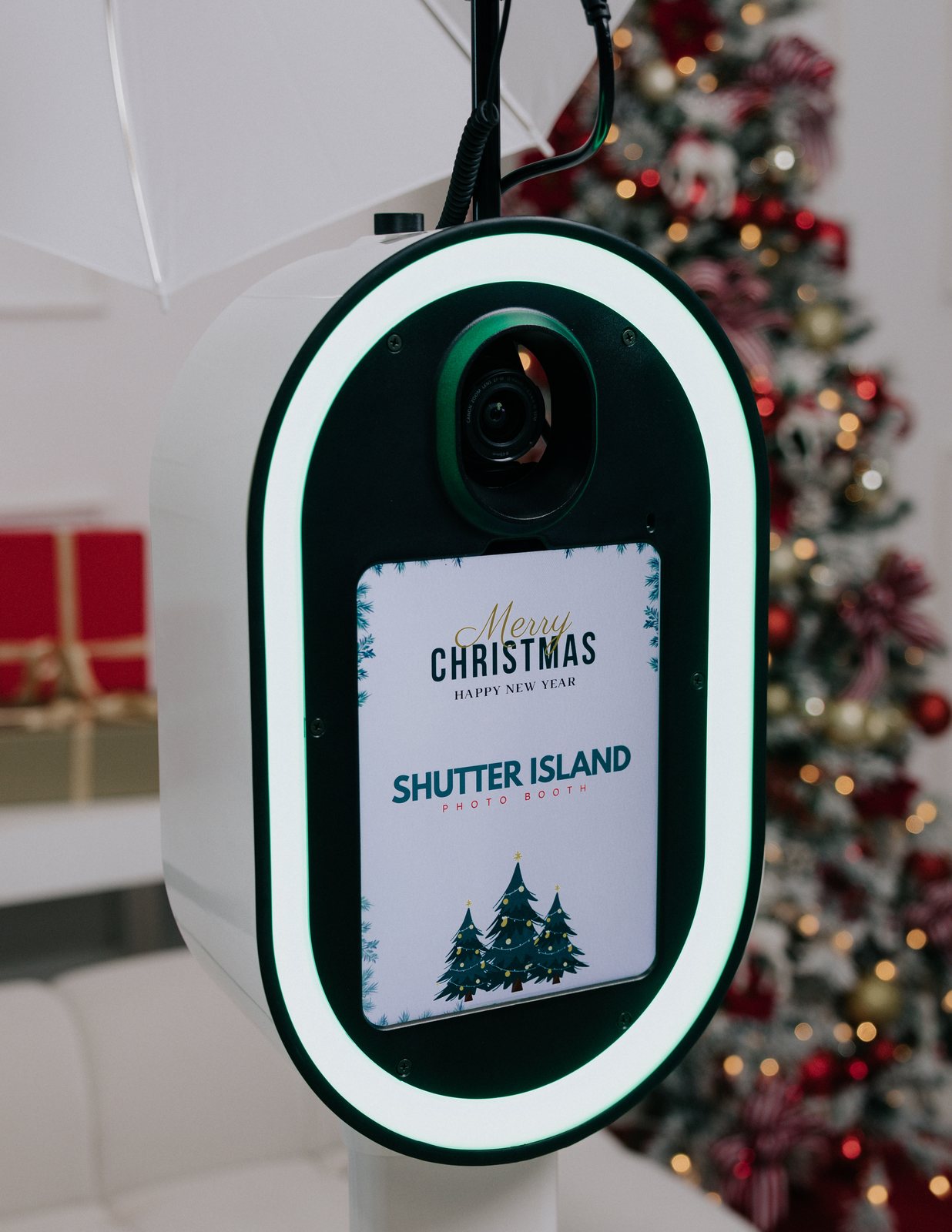 Photo booth screen showing a Merry Christmas print design with the Shutter Island logo